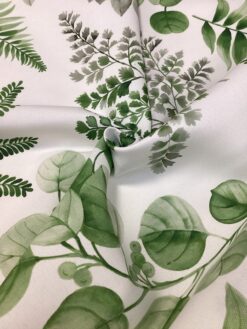 Tessuto antimacchia con stampa foglie verdi
