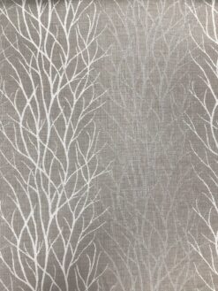 Cotone con motivi rami stilizzati fondo tortora scuro