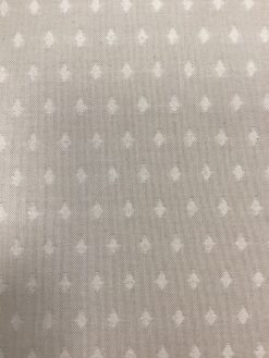 Tessuto rombi panna su fondo tortora