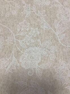 Tessuto resinato fantasia floreale avorio e beige