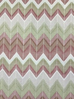 Tessuto misto cotone con motivo geometrico a zig zag nei toni del rosso